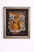 Framed artwork of a tiger's face 
